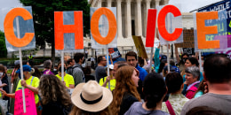 Image: Abortion-rights demonstrators hold up letters spelling out "My Choice."